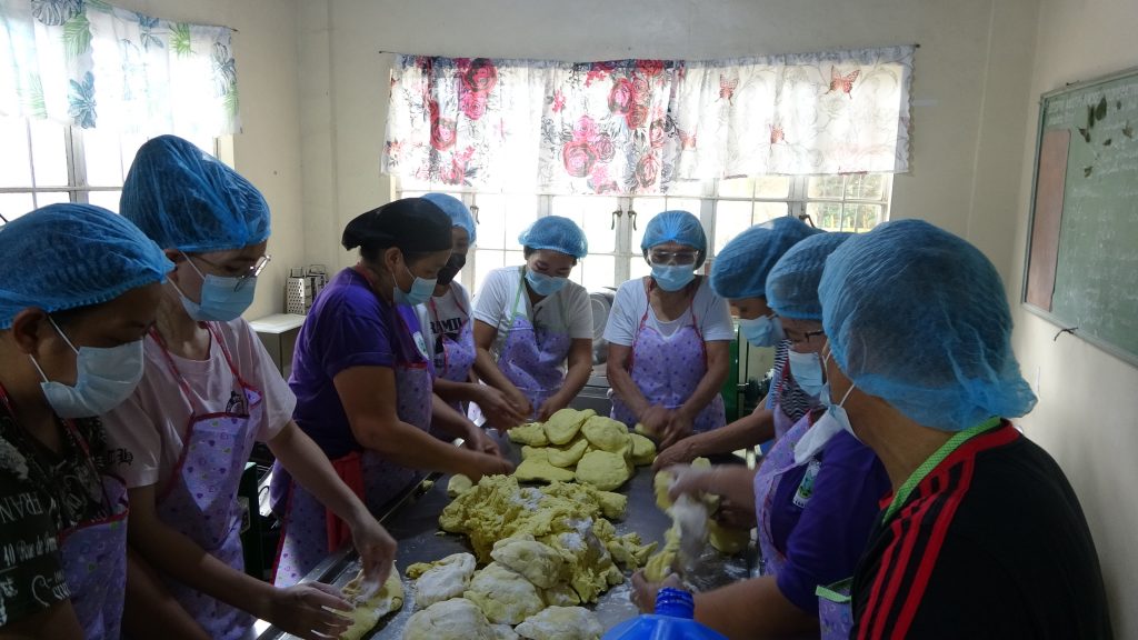 SMPC Members making Fish Noodles