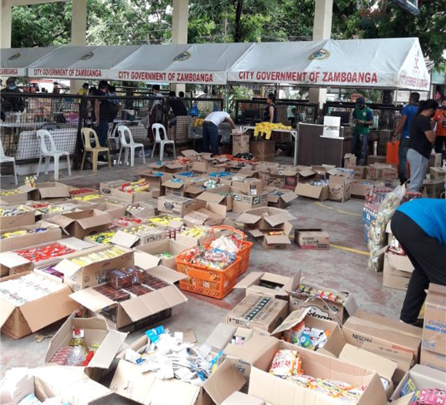 Boxes of goods at the Diskwento Caravan rolling store in Barangay Mampang, Zamboanga