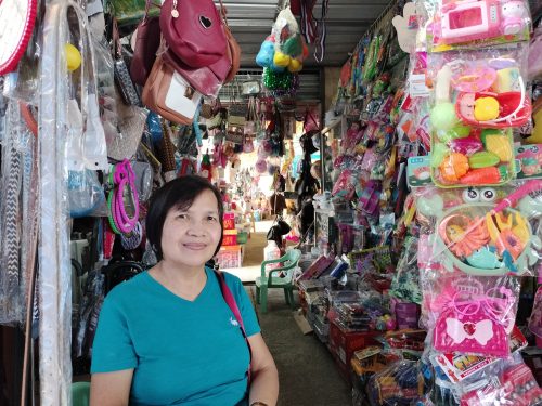 In Photo: Zenaida Arjona Coronado who owns Zeny's Gift Shop