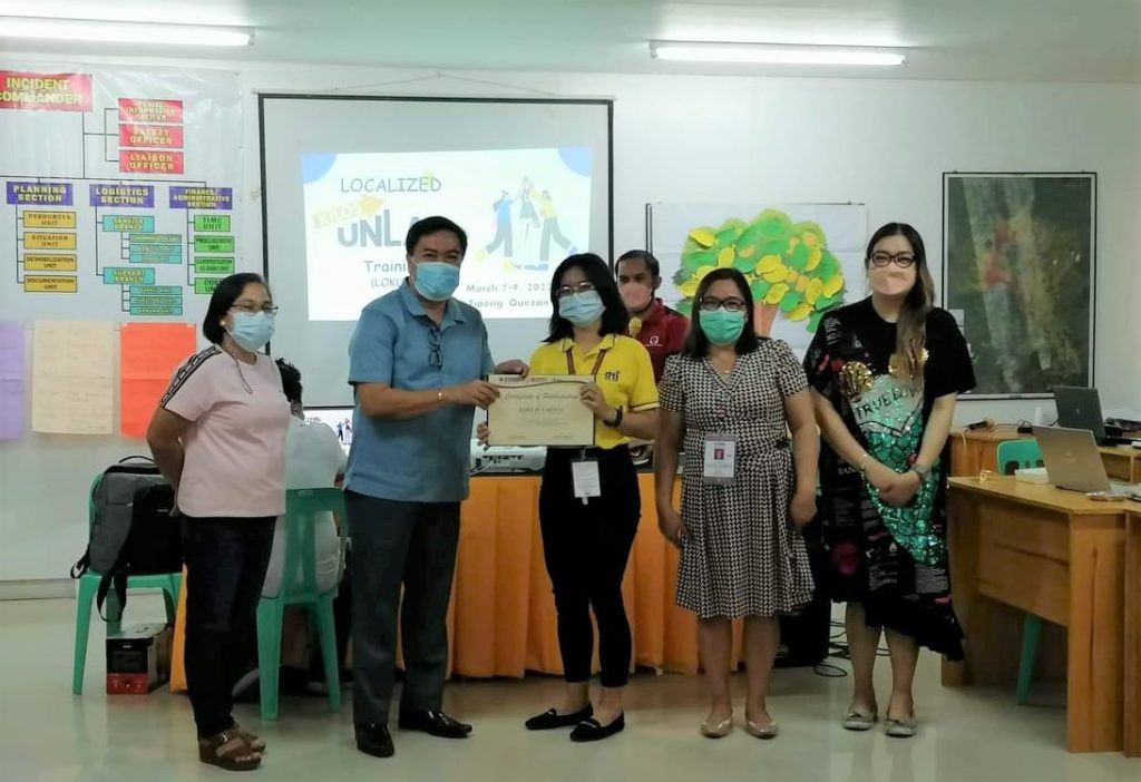 Negosyo Center-Tiaong Business Counselor, Zara H. Capina receiving Certificate of Appreciation