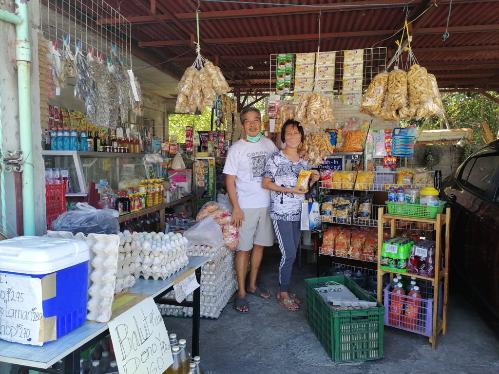 Mr. Jose Maria Fajardo and his wife inside their store.