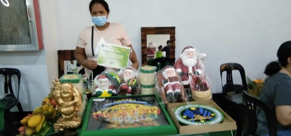 In Photo: Ms. Marilyn C. Bermudo with her products
