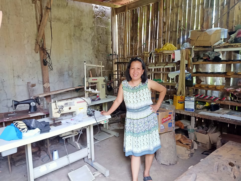In photo: Ms. Leonila Monedo in her footwear shop