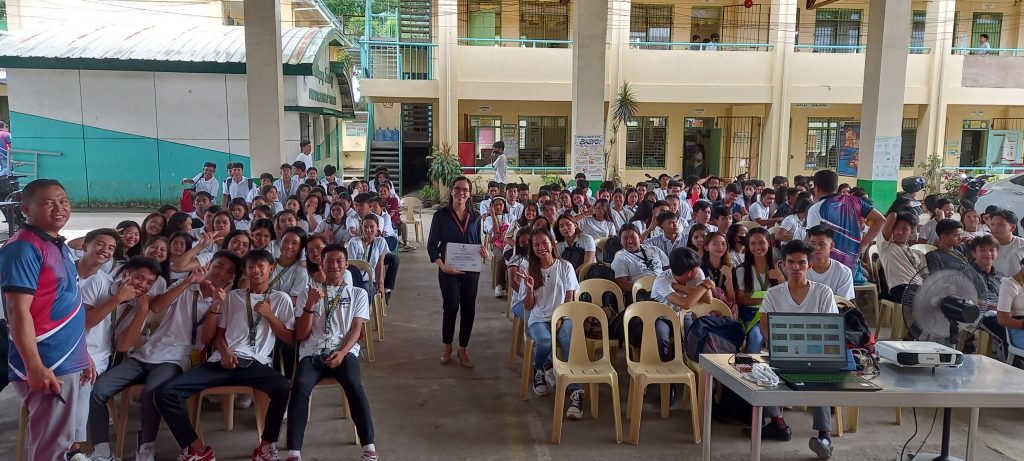 Negosyo Center–San Antonio Business Counselor Daisy S. Lacerna together with the students from San Antonio National Highschool
