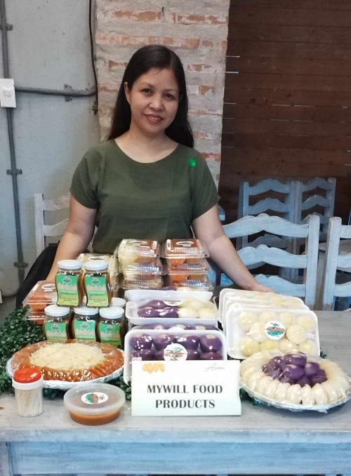in photo: Ms. Myrna, owner of MYWILL's Food Products.