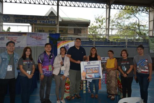 Photo shows one of the 55 sari-sari store owners who received livelihood kits from the Department of Trade and Industry (DTI) Rizal. From L-R: Mr. Aryan Llamasares, Negosyo Center Tanay Sampaloc, Business Counselor, Ms. Marlene D. De Luna, Senior Trade Industry Specialist DTI Rizal BDD, Mr. Bienvenido B. Magpantay, Negosyo Center Counterpart and CTEC Coordinator, Ms. Sharon Dioco, BDD Division Chief, Hon. Vice Mayor Rex Manuel Tanjuatco, Ms. Jennifer Frias, beneficiary from Barangay Tandang Kutyo, OIC Provincial Director Ms. Cleotilde Duran, ; Ms. Jonalyn Adaya, Trade Industry Development Specialist, and Ms. Karla Giannine Reynes, Business Counselor of Negosyo Center Tanay.