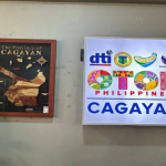 DTI OTOP Philippines store sign for Cagayan Valley, next to framed map of Cagayan province.