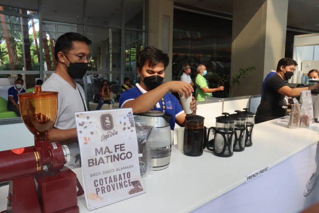 Barista brewing coffee