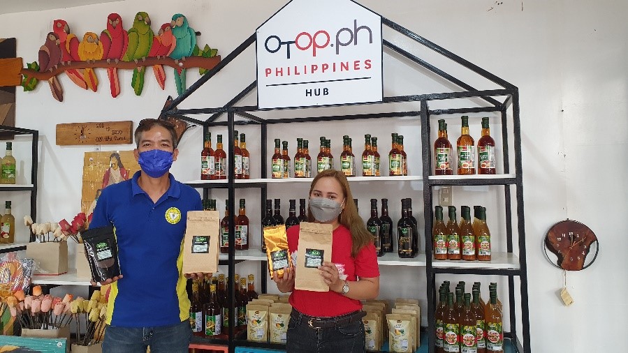 Hojap Multipurpose Cooperative members posing with the Ifugao coffee beans