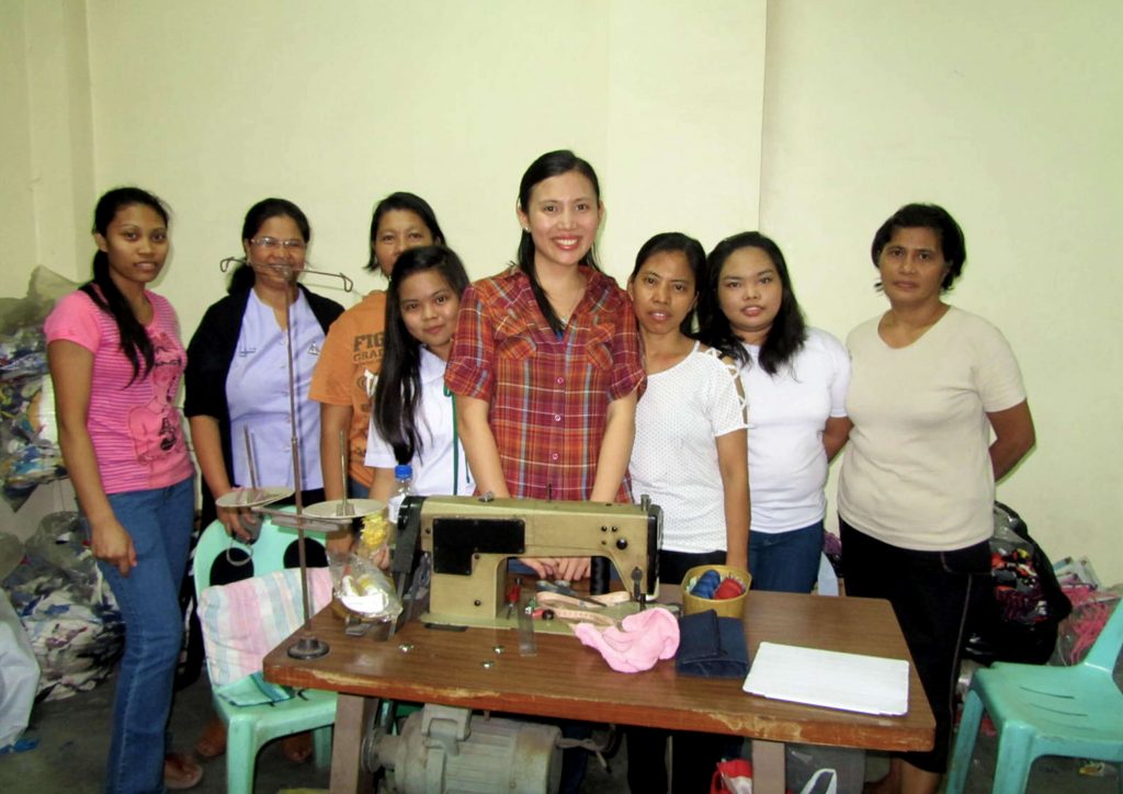 A group photo of Mori Notes staff with the owner, Ms. Mitzi Uy Chan
