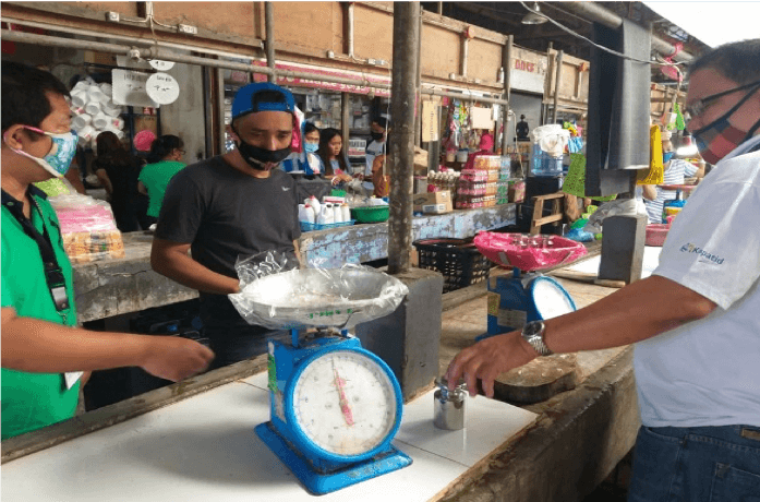 DTI/LGU personnel conducts inspection of weighing scales
