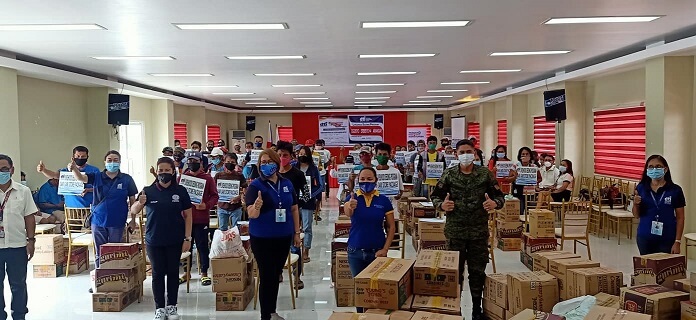 DTI Leyte OIC Prov'l. Director Araceli Larraga and staff, DTI Regional Coordinator for PPG Suzette Pablo, the 93IB, representative from LGU San Isidro, and former rebels who were provided with livelihood kits from DTI