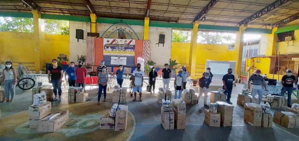 Nineteen fire victims received negosyo starter kits from DTI Asec. Niño Contreras with   DTI Misamis Oriental PD OIC-PD Almer R. Masillones and other government officials