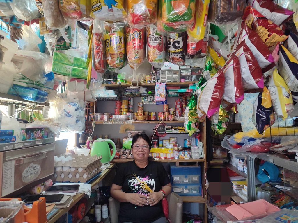 in photo: Ms. Ana Arsolacia, owner of Ohlet's sari-sari store
