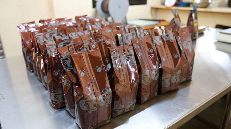 Rows of packaged coffee powder