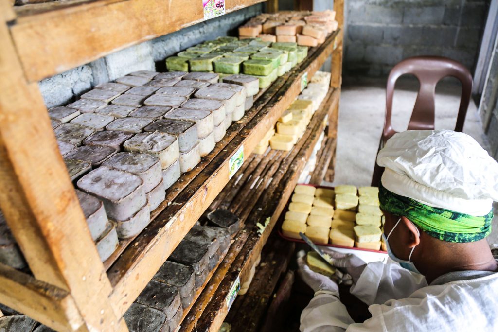 One staff in the process of herbal soap molding