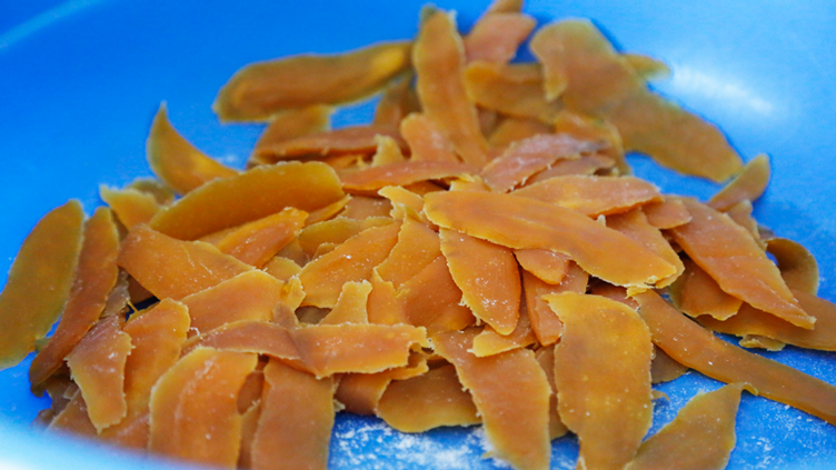Dried mangoes, ready for packaging