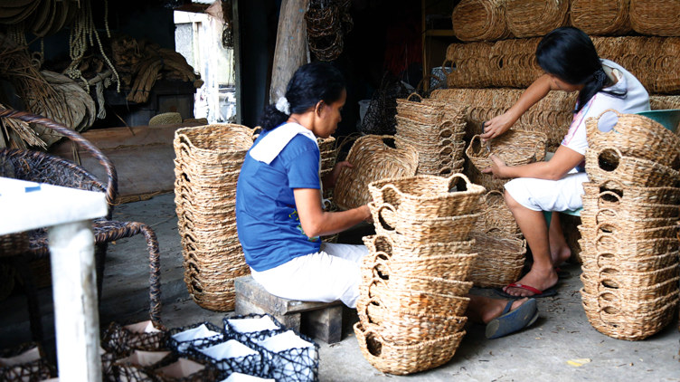 RLM Products employees working on baskets
