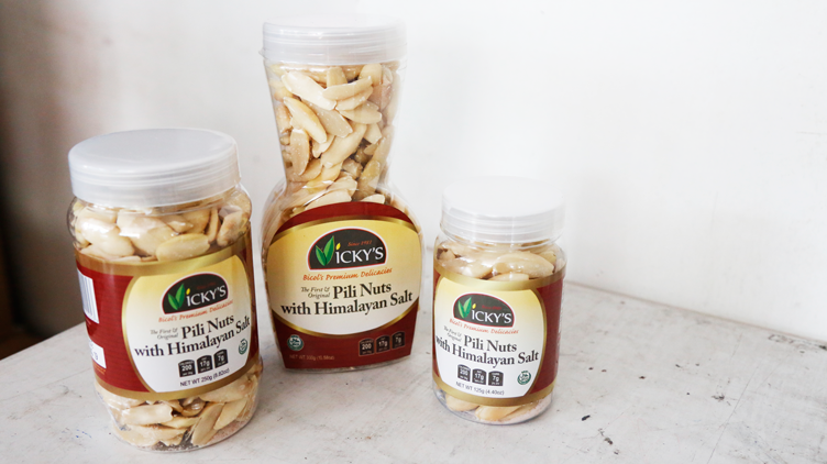 Vicky’s Pili and Food Products' pili nuts with himalayan salt in bottles of various sizes