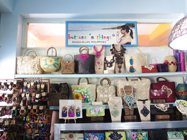 Bags, pouches, ref magnets, earrings, and other accessories at Button 'n Things shop in Aklan