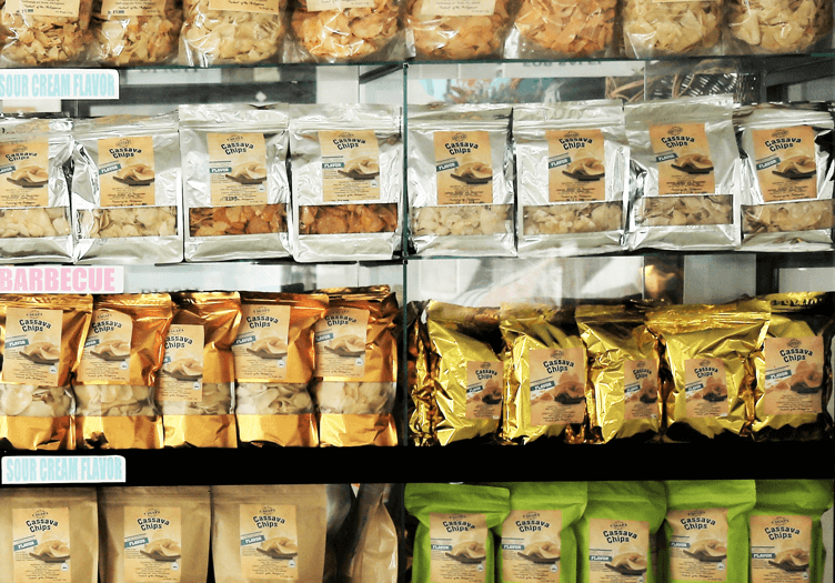 A shelf full of packs of differently flavored cassava chips of the Dapitan Cassava Growers and Processors Association