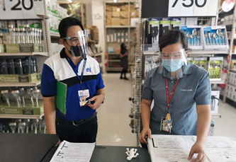Consumer Protection Division OIC-Division Chief Junar Merla of DTI Bukidnon leads the inspection of Handyman in Robinsons Place Valencia for their application of Safety Seal.